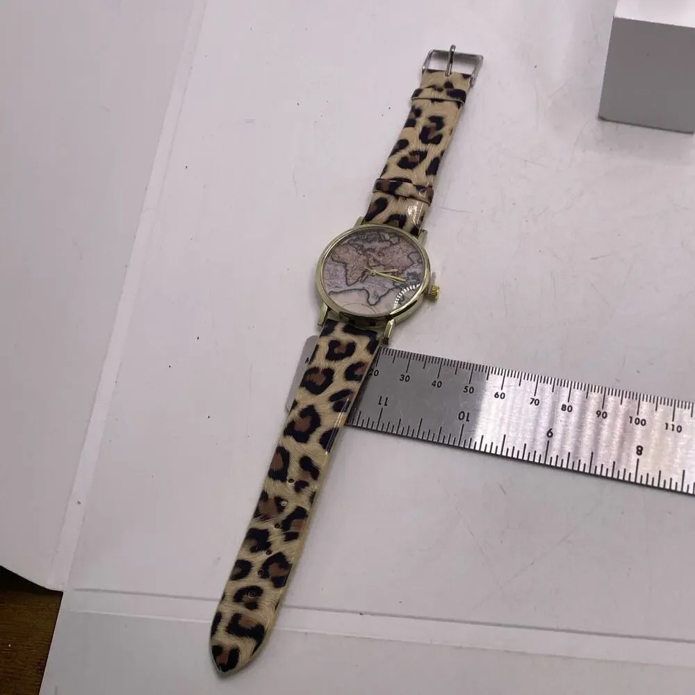 Womens Gold Tone Cheetah World Map Watch New Battery